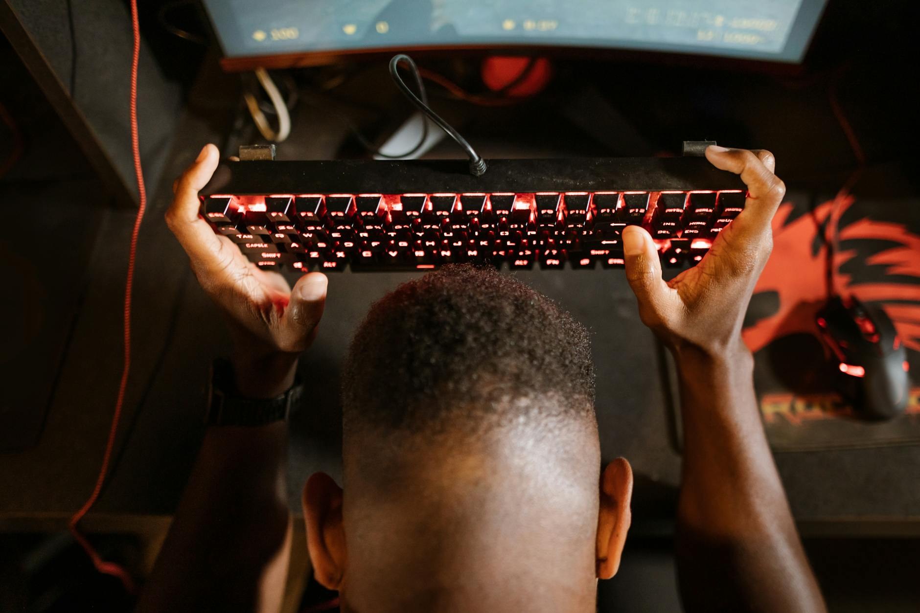 Gaming setup with RGB lighting and multiple monitors